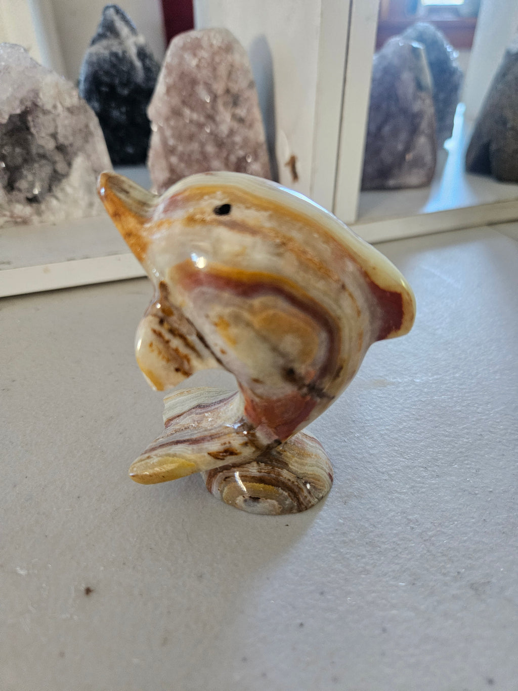 Meduim Banded Calcite Carved Dolphin
