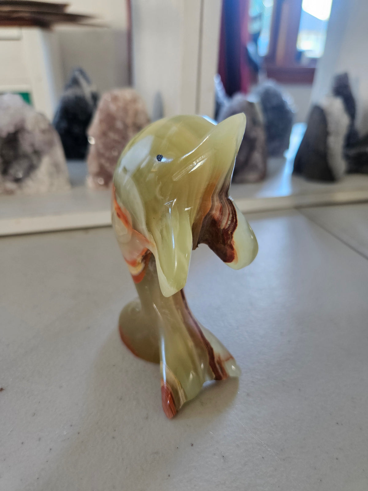 Large Banded Calcite Carved Dolphin