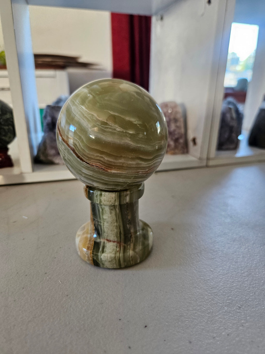 Green Calcite Sphere with Matching Stand