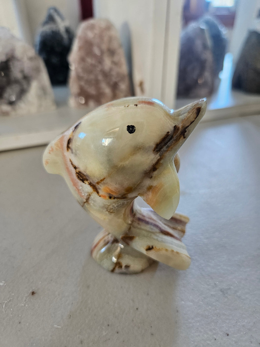 Meduim Banded Calcite Carved Dolphin