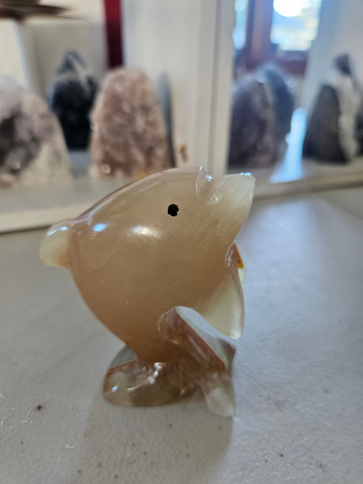 Meduim Banded Calcite Carved Dolphin